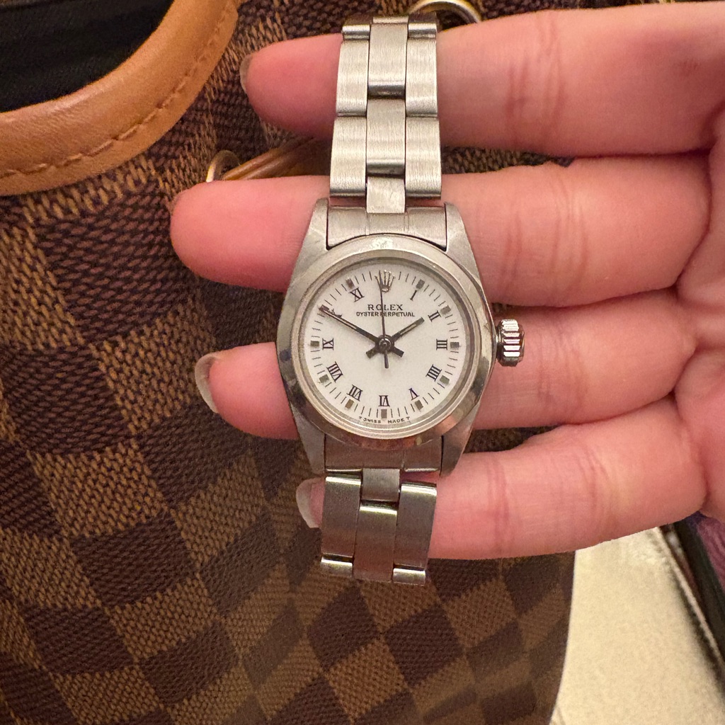 Rolex Silver Timepiece With White Face Ladies Rolex 24mm Date Just